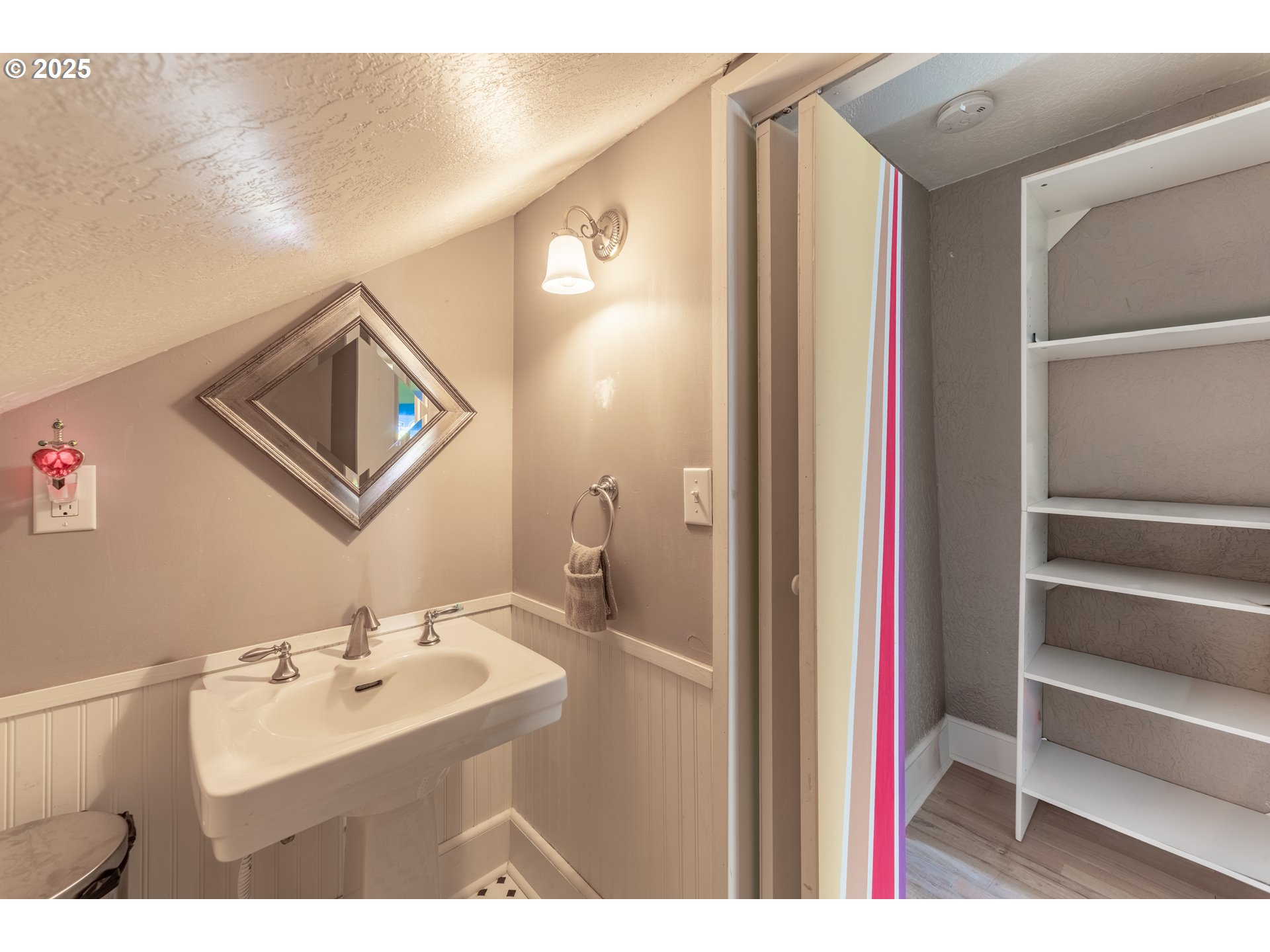 745 16th Street Northeast Salem, OR 97301 - Photo 21 of 32 a bathroom with a sink and a mirror