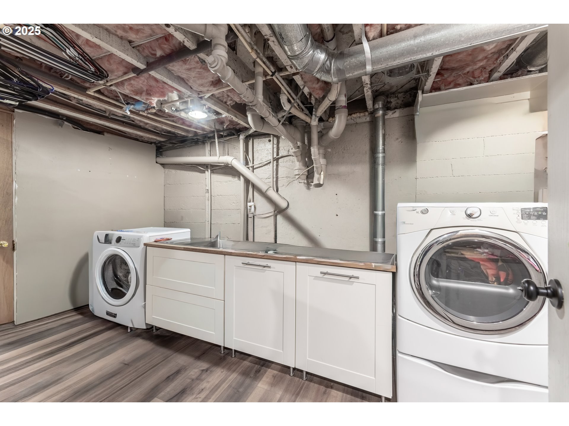 745 16th Street Northeast Salem, OR 97301 - Photo 25 of 32 a utility room with dryer and washer