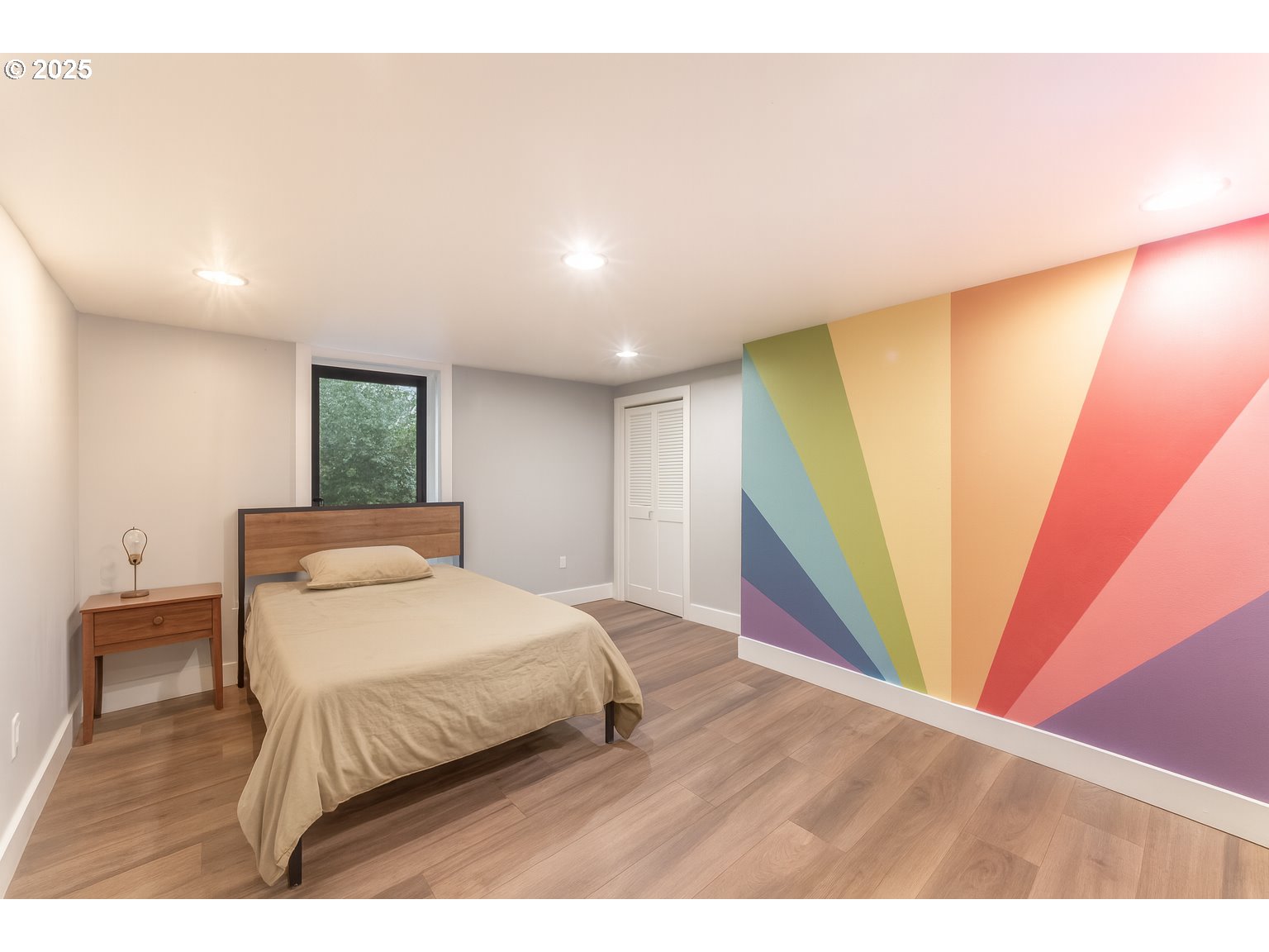 745 16th Street Northeast Salem, OR 97301 - Photo 27 of 32 a bedroom with a bed and a large window