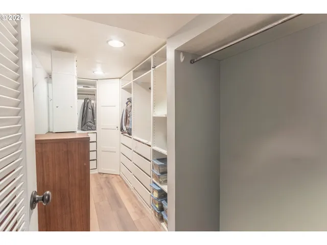 a front view of a house with a garden and patio