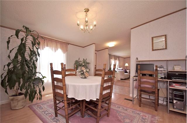 3613 Cooper Nicholson Road Pleasant View, TN 37146 - Photo 12 of 18 a view of a dining room with furniture and chandelier