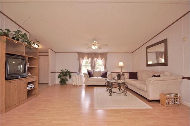 3613 Cooper Nicholson Road Pleasant View, TN 37146 - Photo 5 of 18 a living room with furniture and a flat screen tv
