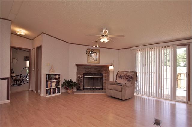 3613 Cooper Nicholson Road Pleasant View, TN 37146 - Photo 6 of 18 a living room with furniture and a fireplace