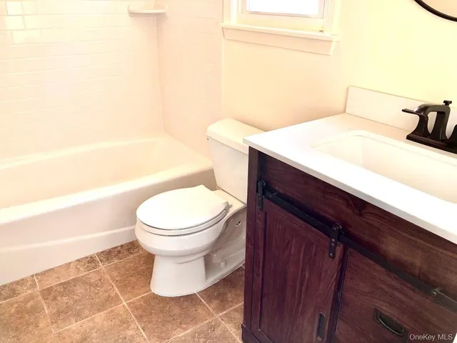 a bathroom with a sink and a toilet