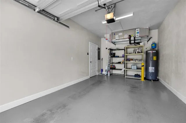 an empty room with storage and utility