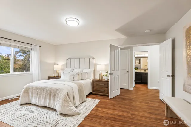 a bedroom with a bed and a walk in closet