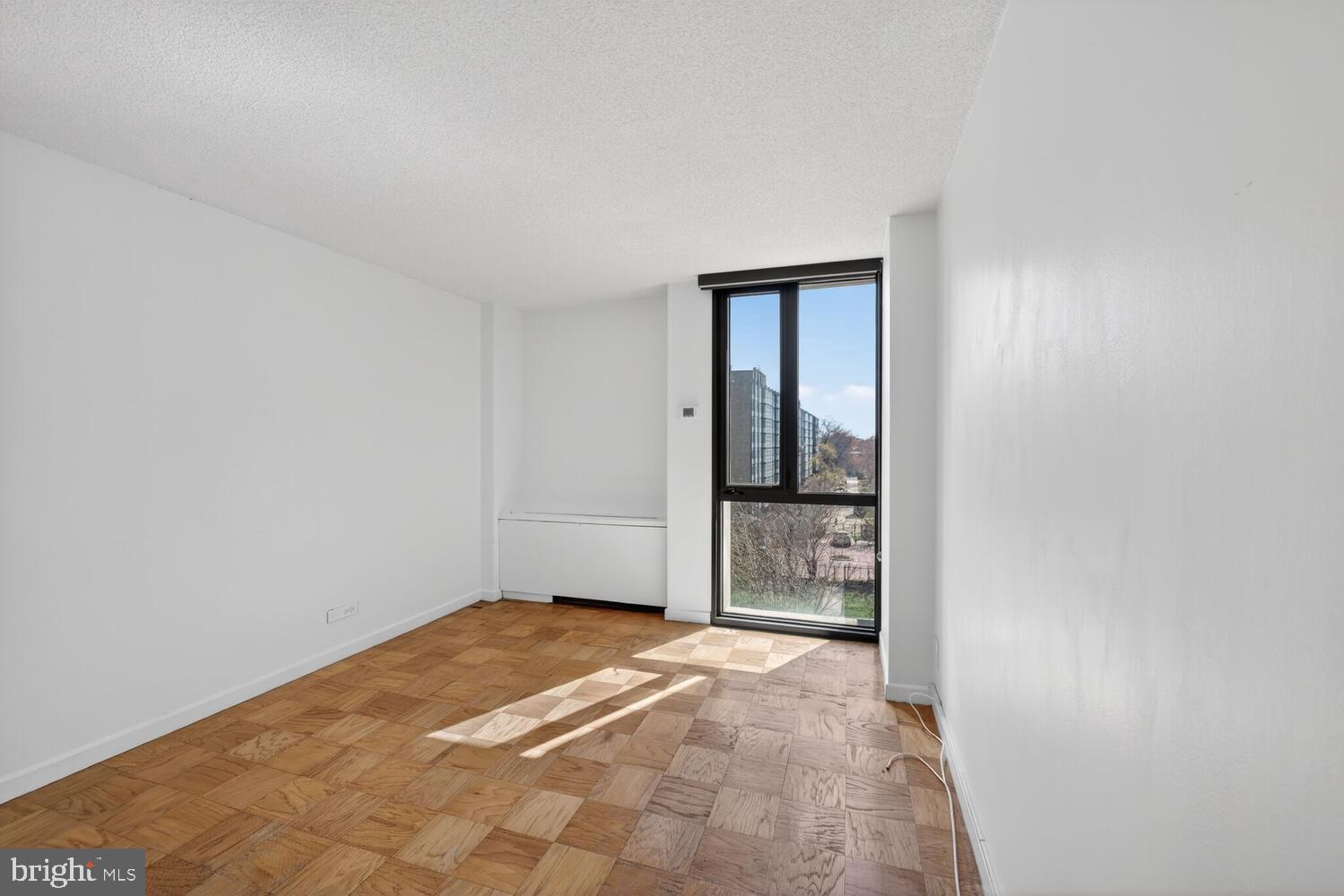 240 M Street Southwest, Unit E406 Washington, DC 20024 - Photo 15 of 38 a view of an empty room