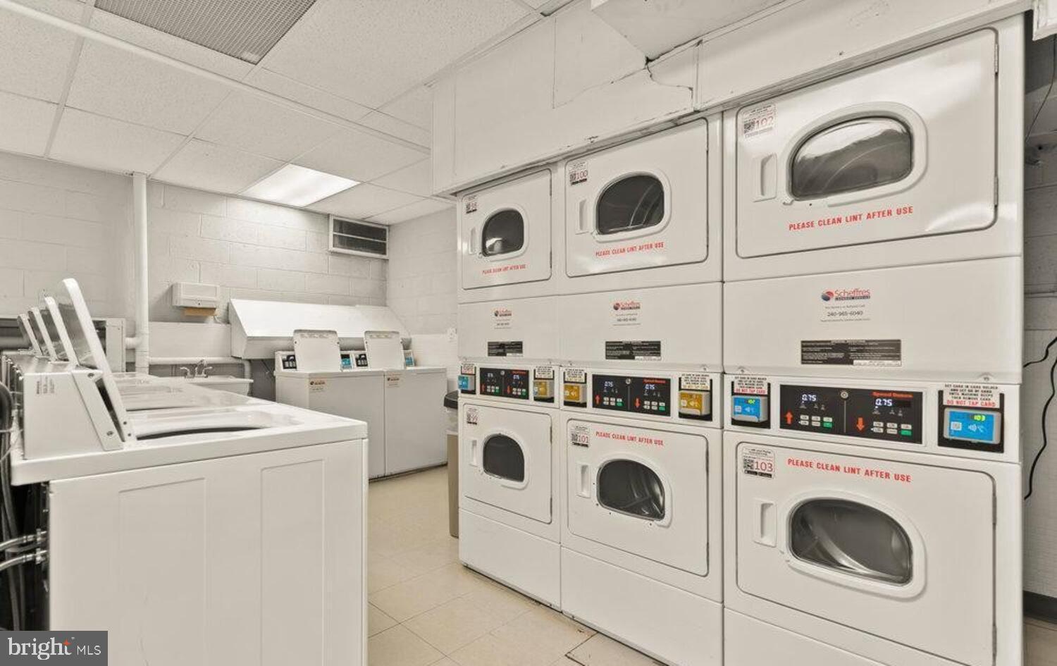 240 M Street Southwest, Unit E406 Washington, DC 20024 - Photo 17 of 38 a view of washer and dryer with washer and dryer