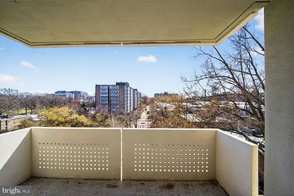 a view of empty room with windows