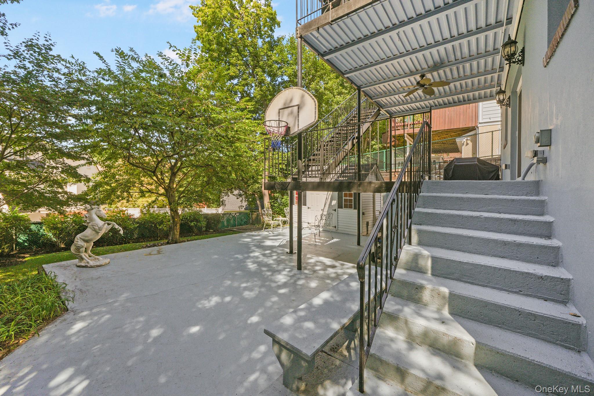 29 Chatfield Road Bronxville, NY 10708 - Photo 22 of 27 Patio / terrace with stairway and basketball hoop