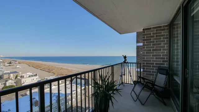 a view of balcony with furniture