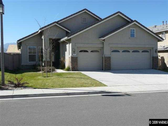 10753 Misty Meadows Drive, Unit 59 Reno, NV 89521 - Photo 1 of 9 a front view of a house with a yard