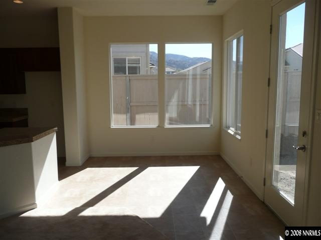 10753 Misty Meadows Drive, Unit 59 Reno, NV 89521 - Photo 4 of 9 a view of an empty room and window