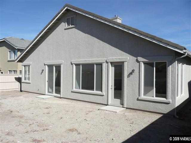 10753 Misty Meadows Drive, Unit 59 Reno, NV 89521 - Photo 9 of 9 a front view of a house