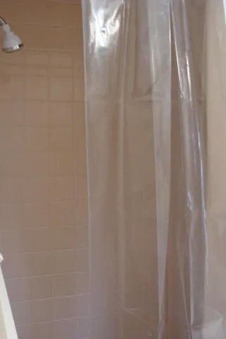 a close up of a white curtain