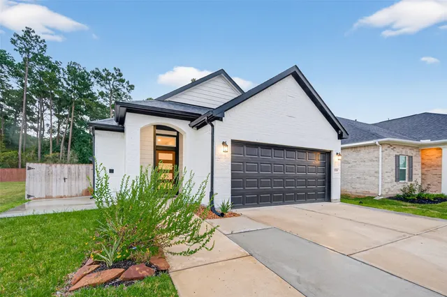 front view of a house and a yard