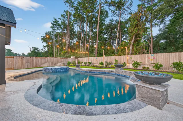 a view of a swimming pool with a sitting space