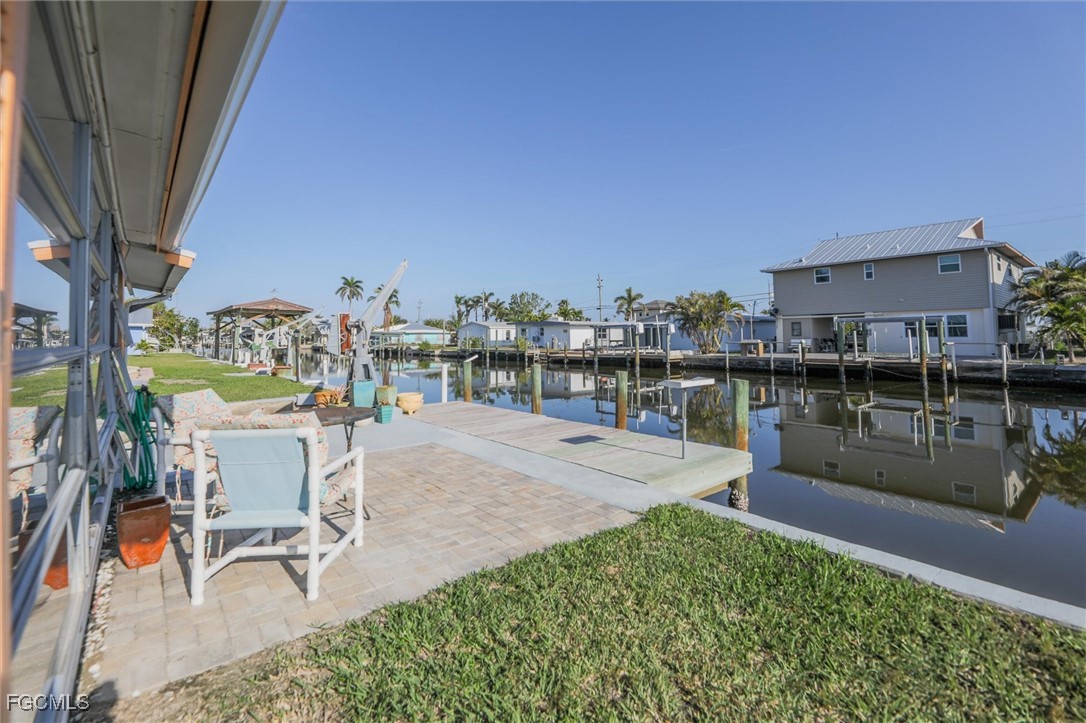 11494 May Street Matlacha, FL 33993 - Photo 33 of 45 a view of a lake with a terrace