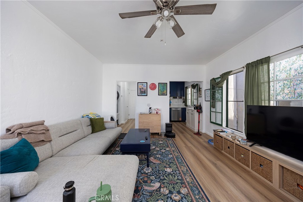 28 Argonne Avenue Long Beach, CA 90803 - Photo 4 of 20 a living room with furniture and a flat screen tv