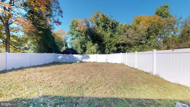 a view of a big yard with an buildings