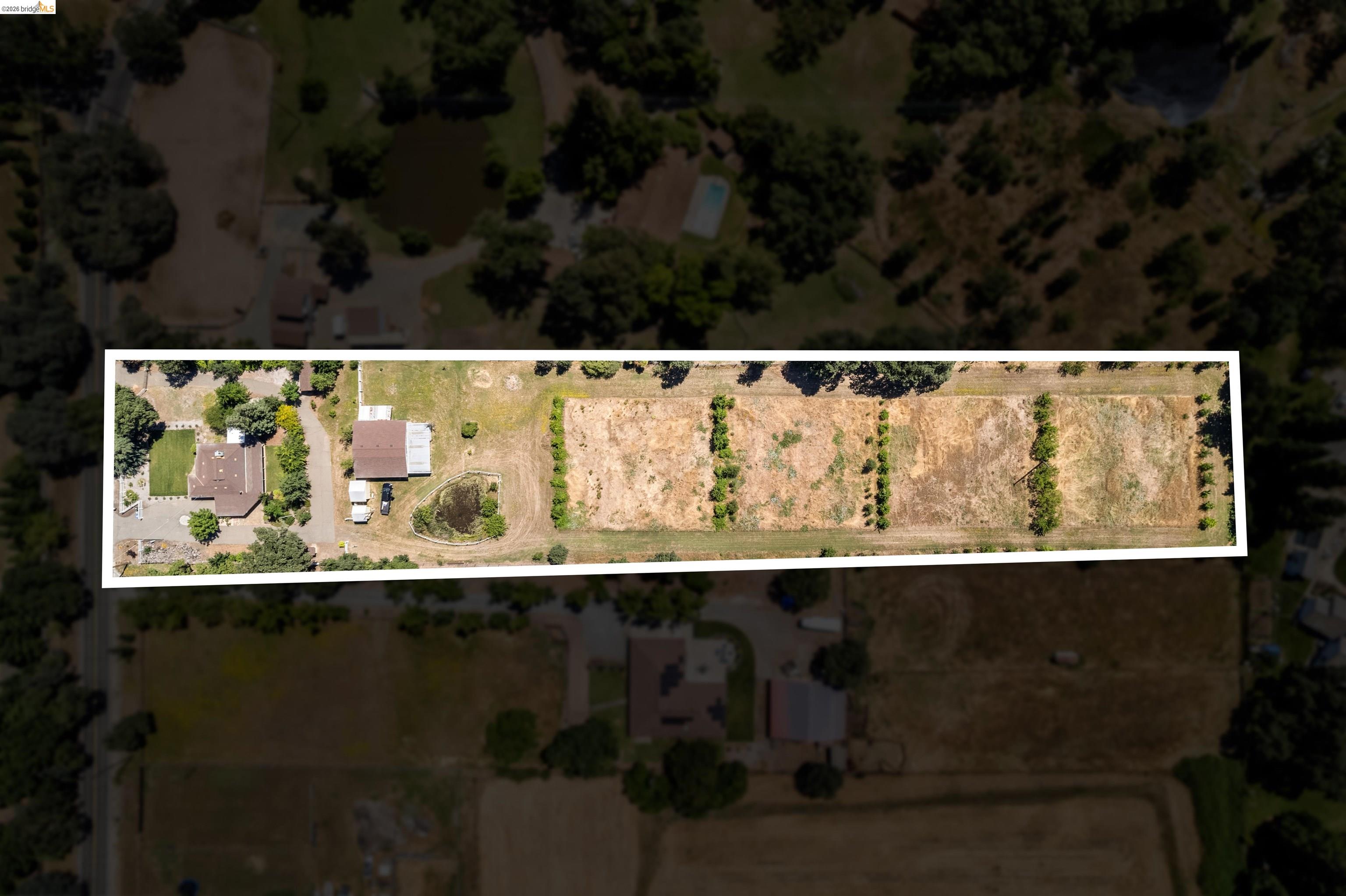 10474 Sheldon Road Elk Grove, CA 95624 - Photo 69 of 83 Expansive property featuring a main residence, secondary structure, and multiple cultivated fields