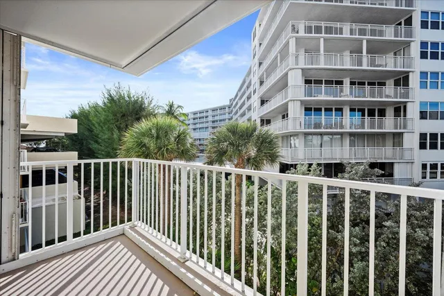 a view of a building from a balcony