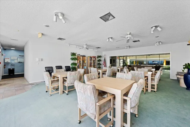 a view of a dining room with furniture