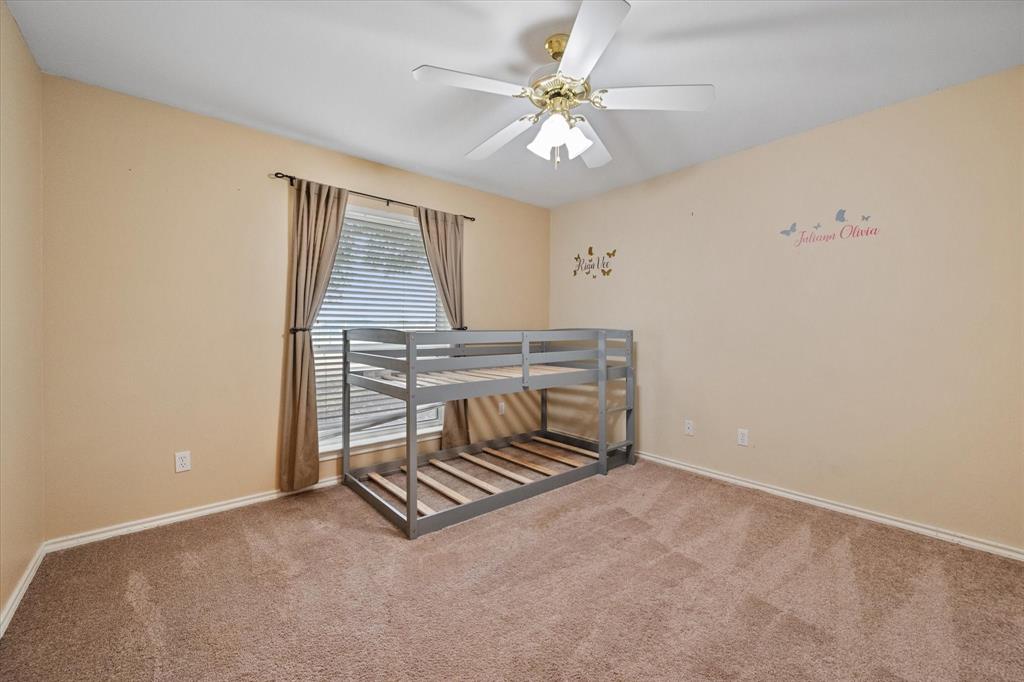 5250 Plainview Road Midlothian, TX 76065 - Photo 16 of 37 a room with stairs and a chandelier