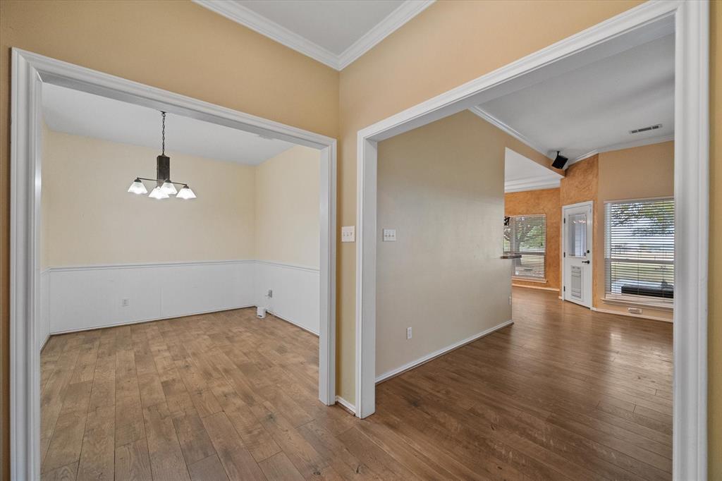 5250 Plainview Road Midlothian, TX 76065 - Photo 10 of 37 wooden floor in an empty room with a window