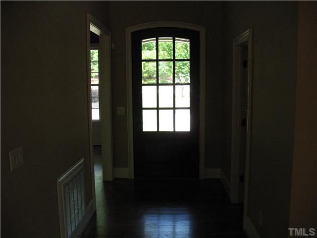 7308 Ridgeline Drive Raleigh, NC 27613 - Photo 3 of 20 Open foyer with hardwood floors.