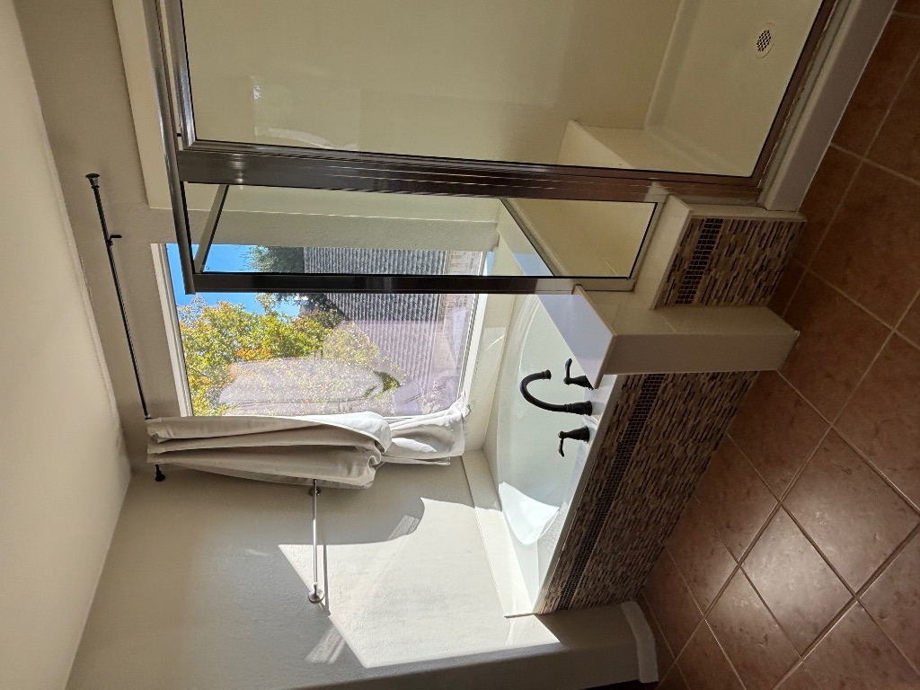 714 Adler Falls Lane Round Rock, TX 78665 - Photo 11 of 18 a bathroom with a sink and a large mirror