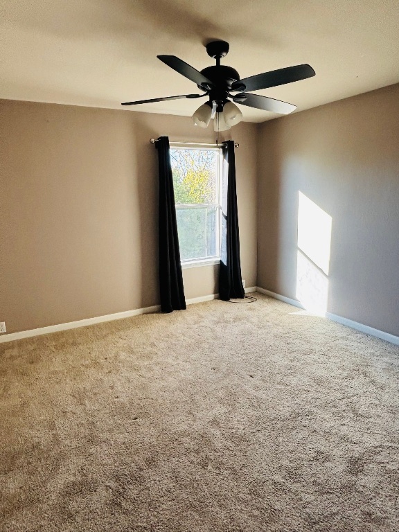 714 Adler Falls Lane Round Rock, TX 78665 - Photo 14 of 18 a view of a livingroom with a ceiling fan and window