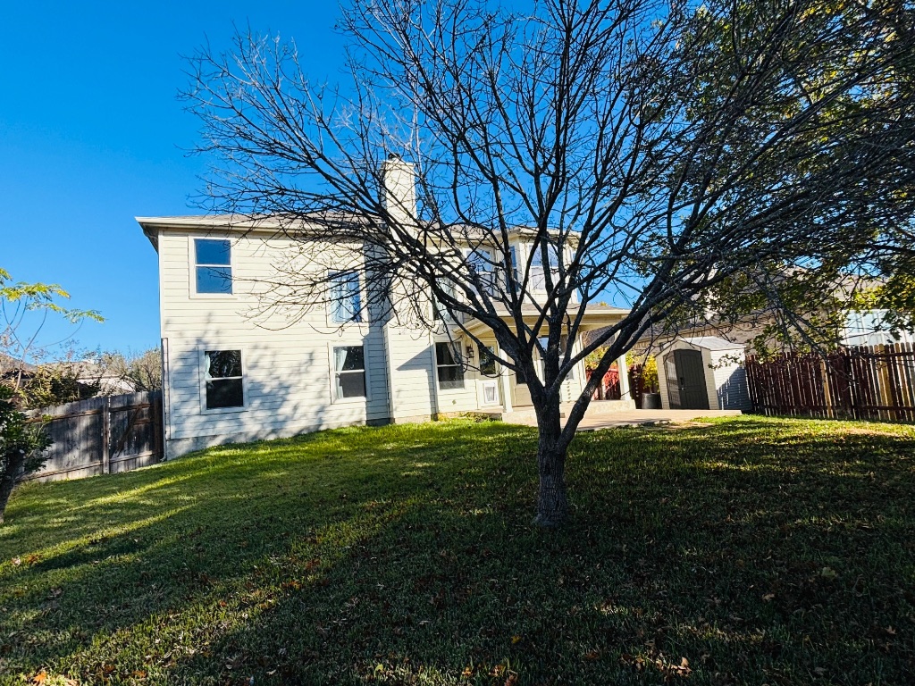 714 Adler Falls Lane Round Rock, TX 78665 - Photo 15 of 18 a front view of a house with a garden