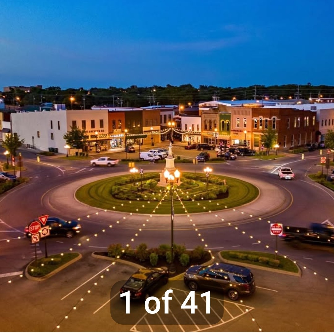 1906 Cascade Court Lebanon, TN 37087 - Photo 17 of 18 a view of a swimming pool with a table and chairs