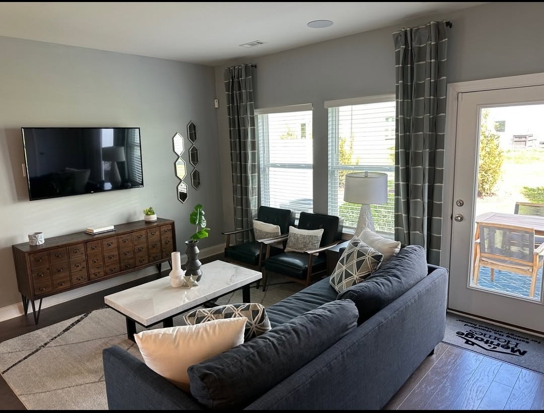 1906 Cascade Court Lebanon, TN 37087 - Photo 6 of 18 a living room with furniture and a flat screen tv