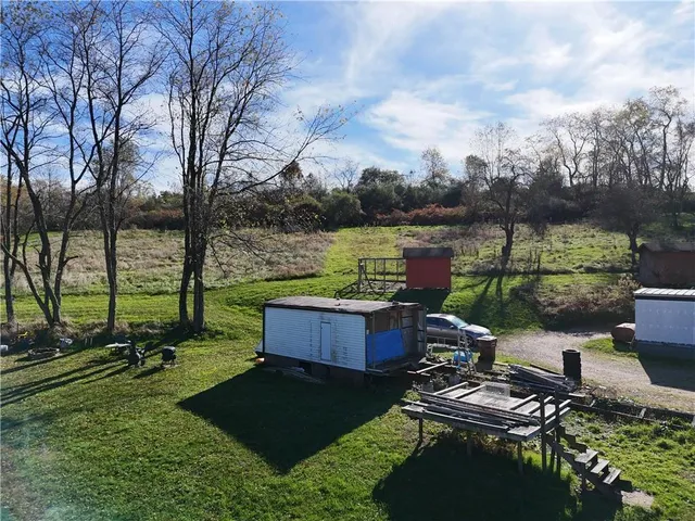 a view of a lake with a yard