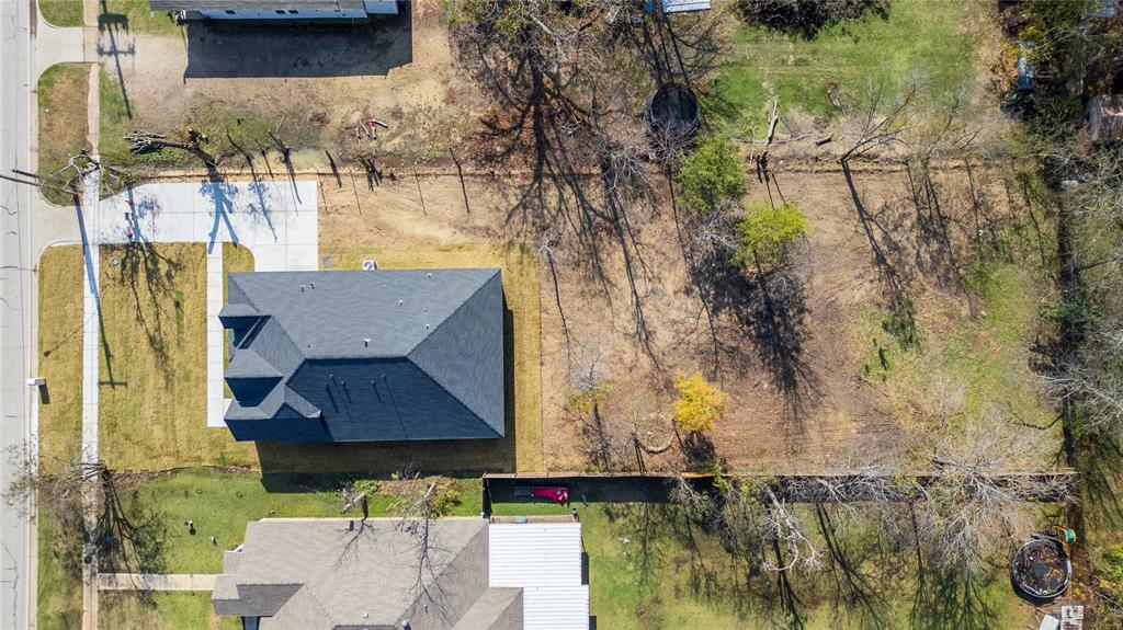 817 North Virginia Street Terrell, TX 75160 - Photo 18 of 20 a aerial view of a house with a yard