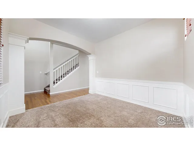 a bathroom with a sink a vanity and a large mirror