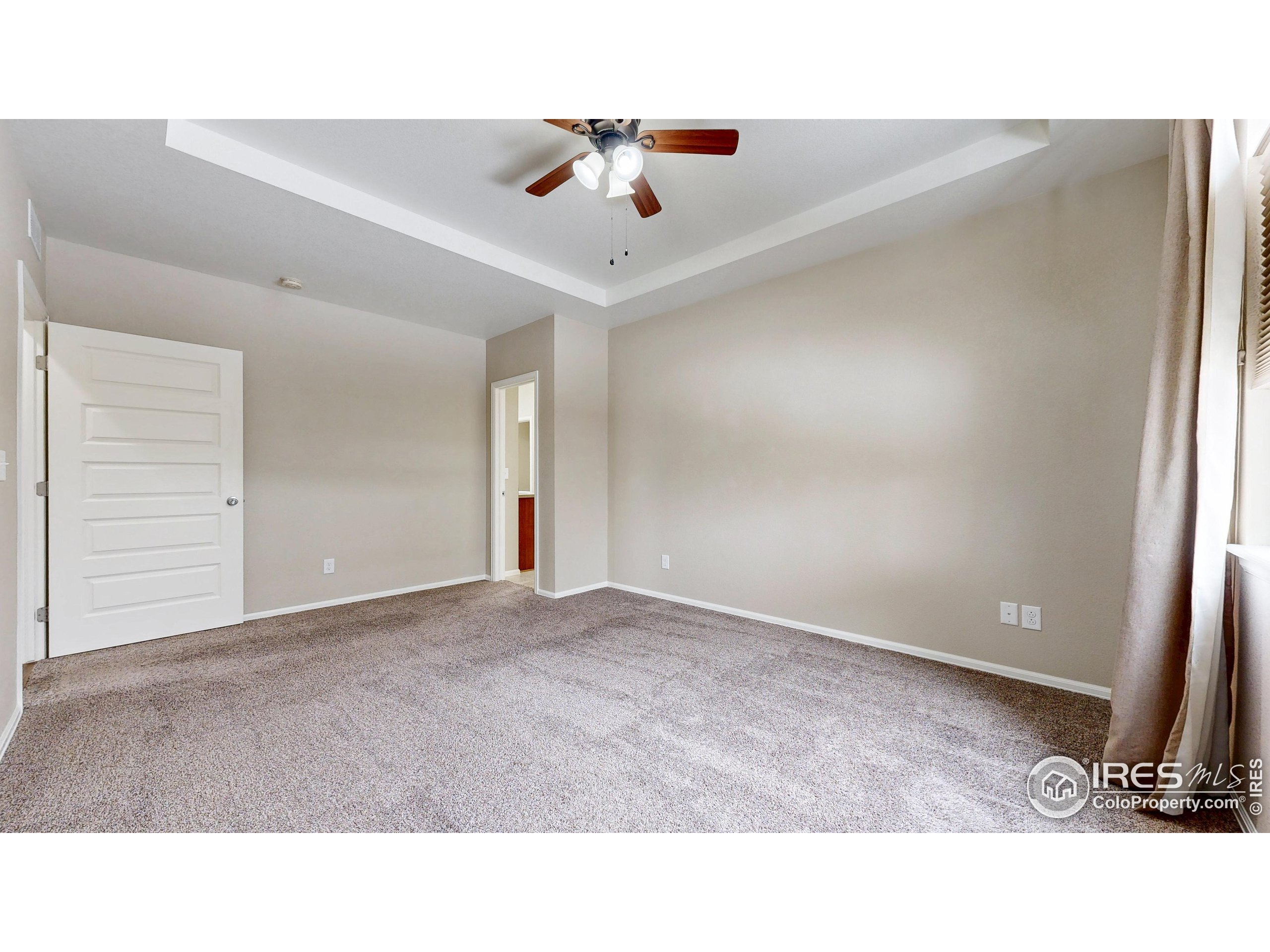 5543 Calgary Street Timnath, CO 80547 - Photo 14 of 38 a open hall with a ceiling fan