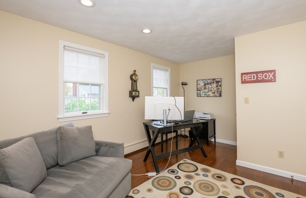 25 Ellen Road Stoneham, MA 02180 - Photo 25 of 41 a living room with furniture and a window