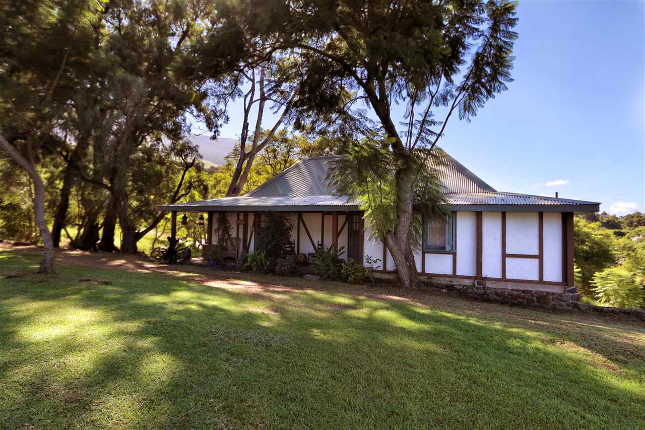 5231 Lower Kula Road Kula, HI 96790 - Photo 11 of 29 a view of a house with a yard and tree s