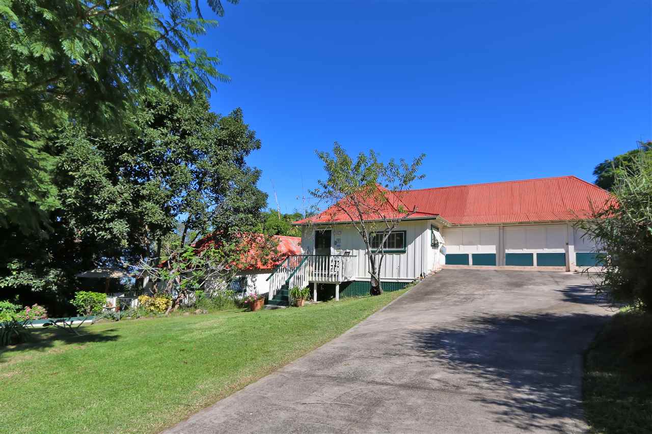 5231 Lower Kula Road Kula, HI 96790 - Photo 21 of 29 a view of a house with a yard