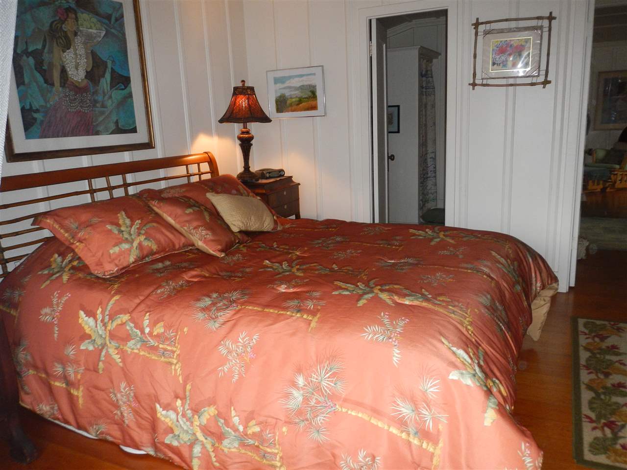 5231 Lower Kula Road Kula, HI 96790 - Photo 24 of 29 a bed sitting in a bedroom next to a window