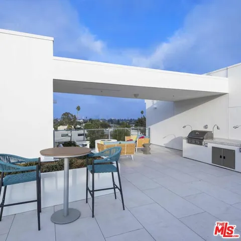 a view of a chairs and table in a room