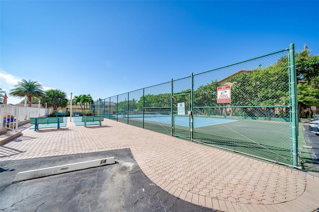 1009 North Ocean Boulevard, Unit 407 Pompano Beach, FL 33062 - Photo 23 of 35 a view of a park with basketball court