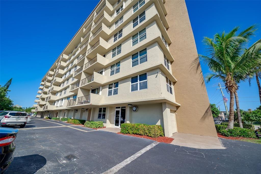 1009 North Ocean Boulevard, Unit 407 Pompano Beach, FL 33062 - Photo 24 of 35 a view of a building with a street