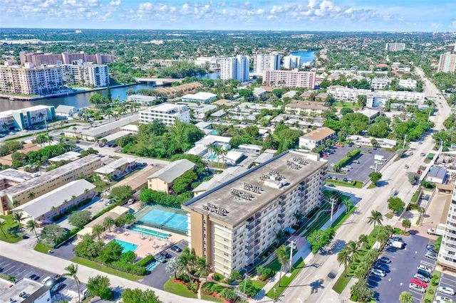 a view of a street with a building in the background