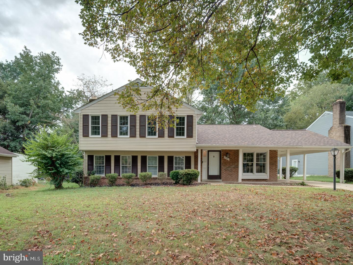 10397 Blue Arrow Court Columbia, MD 21044 - Photo 1 of 43 front view of a house with a garden
