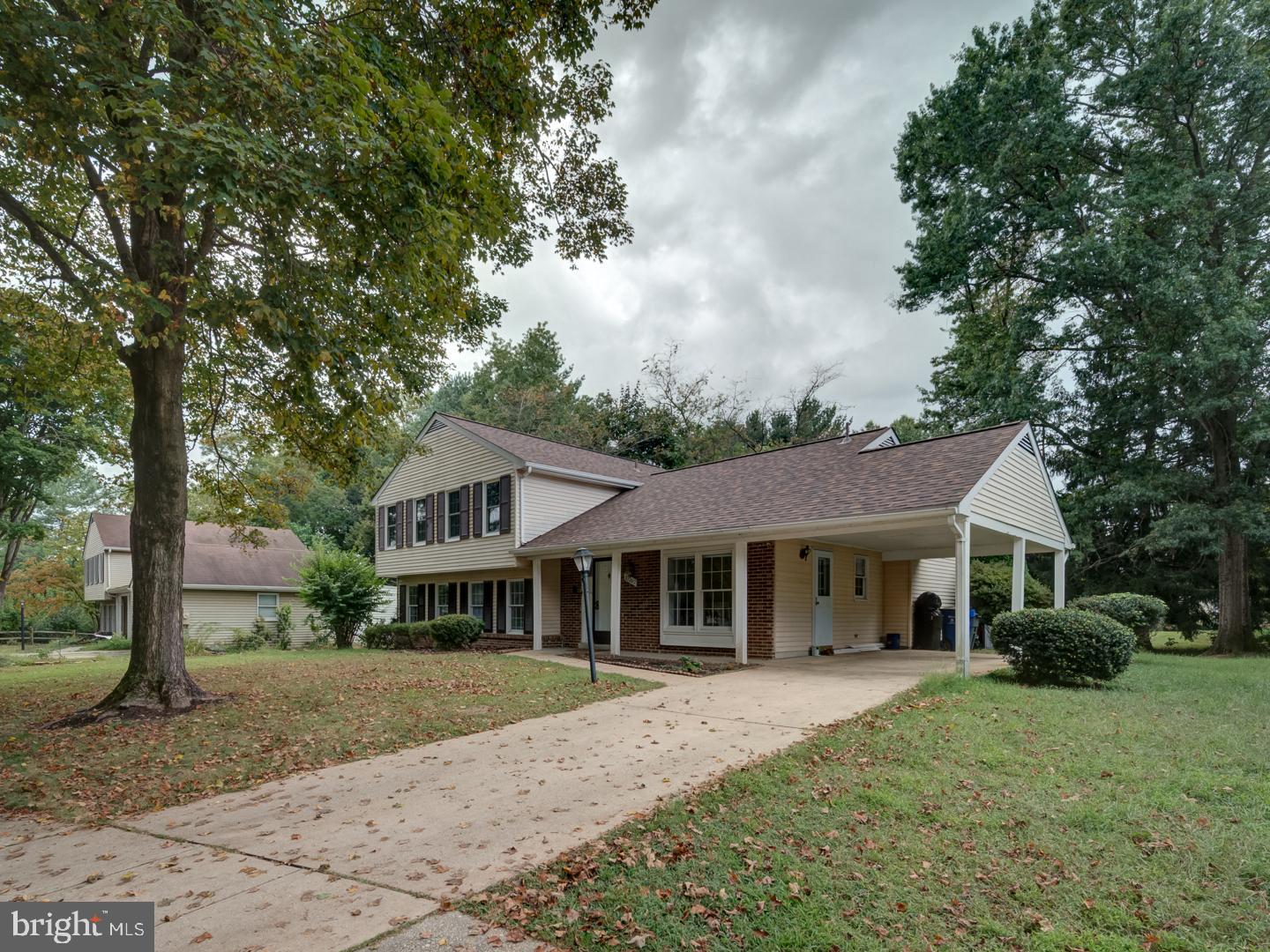 10397 Blue Arrow Court Columbia, MD 21044 - Photo 2 of 43 a front view of a house with a garden