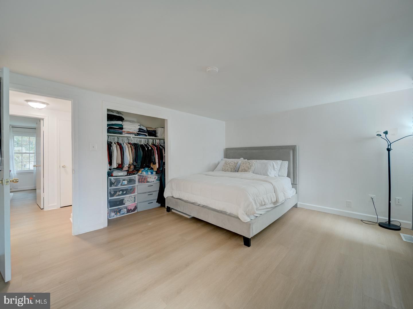 10397 Blue Arrow Court Columbia, MD 21044 - Photo 22 of 43 a bedroom with a bed and walk in closet